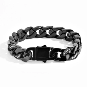 Detail of 12mm black Cuban link bracelet featuring CZ micro-pave and secure box clasp