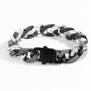 Close-up of 12mm black and silver Cuban link bracelet with micro-paved cubic zirconia stones