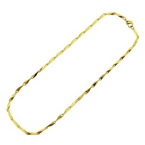 Polished gold bamboo link chain necklace with lobster clasp in a minimalist geometric style