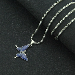 Deep blue butterfly pendant necklace with galaxy glitter on silver box chain