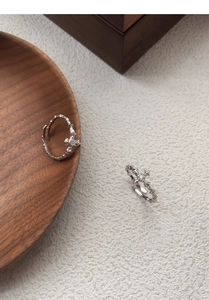 Detailed close-up of S925 silver star cross ring featuring retro lava texture and zircon