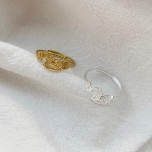 Set of gold and silver S999 sterling silver rocking horse rings with coin charms