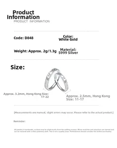 Detail showing S999 sterling silver couple rings with engraved butterfly patterns and dimensions