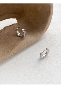 Detailed macro view of S925 sterling silver earring featuring purple enamel textures