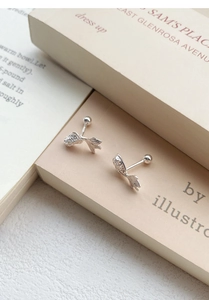 Detailed macro view of S925 sterling silver koi fish stud earrings with screw backs