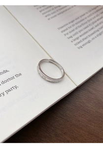 Close-up of S999 sterling silver open ring with romantic fireworks and butterfly engraving