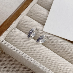 Elegant S925 sterling silver drop glaze earrings with blue irregular wave pattern