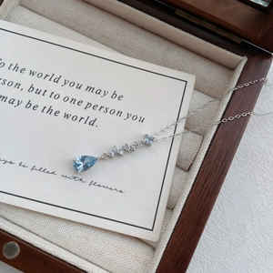 Elegant S999 silver necklace with blue teardrop zircon in a premium wood gift box