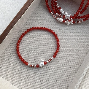Bracciale S999 in argento e agata rossa con ciondolo a forma di cavallo per donna