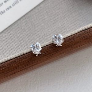 Exquisite S999 sterling silver heart-shaped stud earrings with sparkling cubic zirconia stones