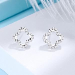 Sparkling S925 sterling silver hollow clover stud earrings with pavé set crystals
