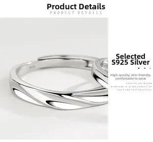 Detailed macro shot of S925 sterling silver ring showing polished wavy twist and inner stamp