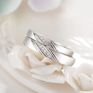 Minimalist S925 sterling silver couple rings set with cubic zirconia in a modern cross design