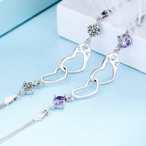 Elegant S925 sterling silver double heart bracelet with purple and white zircon accents