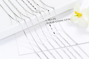 Close-up showing eight types of S925 sterling silver chains like snake and box style