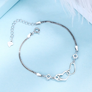 Elegant S925 sterling silver double heart bracelet featuring sparkling cubic zirconia