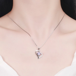 S925 silver heart pendant necklace with purple gemstone on female model