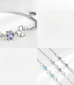Dettaglio del bracciale quadrifoglio in argento sterling S925 con zirconi blu e viola lucidi