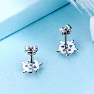 Minimalist S925 sterling silver snowflake stud earrings with sparkling crystal accents