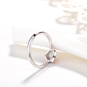 Bague ajustable en argent S925 avec motif cœur et détail rouge style minimaliste