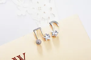 Detail of S925 sterling silver musical note earrings with sparkling cubic zirconia stones