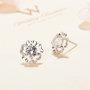 S925 sterling silver plum blossom stud earrings with sparkling cubic zirconia center