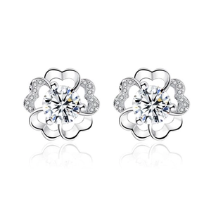 Elegant S925 sterling silver plum blossom earrings with sparkling zircon gemstones