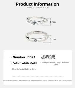 Detail view showing S925 sterling silver angel wing rings with adjustable open band design