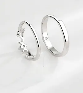Macro shot of S925 sterling silver couple rings showing the internal hallmark and fine detail