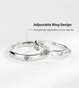 Detail view of S925 silver angel wing rings with adjustable bands and sparkling zircon stones
