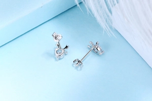 Close-up of S925 sterling silver reindeer antler stud earrings with sparkling cubic zirconia