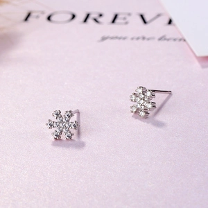 Boucles d'oreilles flocon de neige en argent S925 avec zircons blancs sur fond rose
