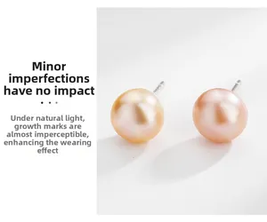 Macro detail of S999 sterling silver pearl studs with natural growth textures and soft pink luster