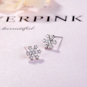 Boucles d'oreilles flocons en argent sterling S925 avec cristaux sur fond rose