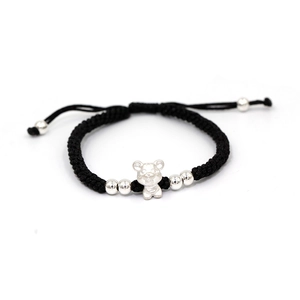 Detail of hand-woven black cord bracelet with S999 sterling silver zodiac rat charm
