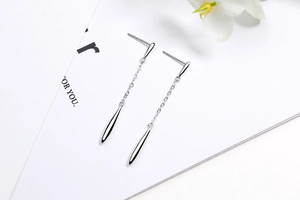 Detail of S925 sterling silver stamp on minimalist long tassel water drop earrings