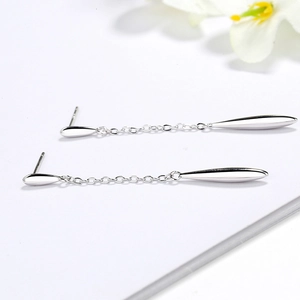 Elegant S925 sterling silver long tassel drop earrings with geometric waterdrop charms