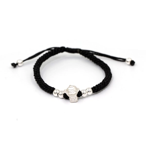 Macro shot of hand-woven black cord bracelet with S999 silver monkey charm and beads