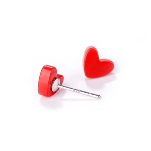 S925 sterling silver heart earrings with red enamel finish on white background