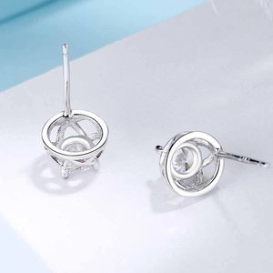 S925 sterling silver four-leaf clover stud earrings with hollow textured round frame