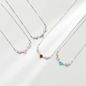 Detailed view of S925 sterling silver deer antler heart pendants in four vibrant colors