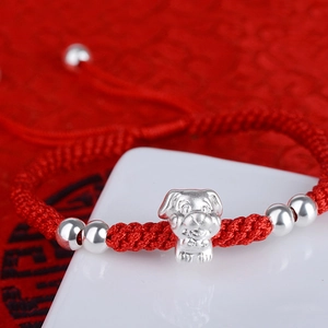 Handcrafted red cord bracelet with S999 silver zodiac dog charm and metallic beads