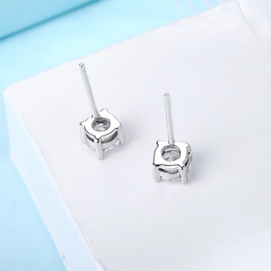 Minimalist S925 sterling silver stud earrings with round cubic zirconia in 4-prong setting