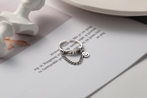 Vintage 925 silver ring with Good Luck pendant and smiley face on chain detail