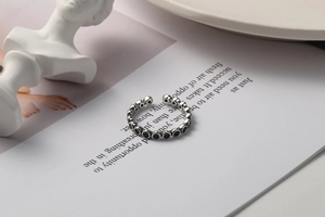 Detailed macro view of S925 sterling silver ring with vintage black cubic zirconia