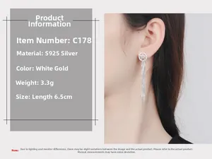 Detailed view of S925 sterling silver long tassel star earrings on an Asian model