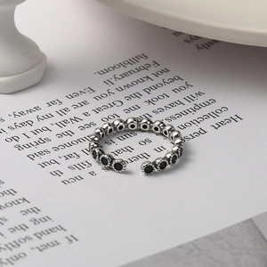 Vintage S925 sterling silver open ring with black zircon stones in a retro design