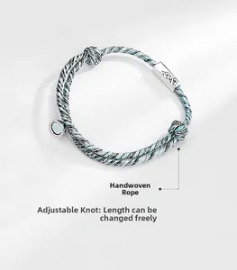 Macro detail of hand-woven rope bracelet with magnetic clasp and adjustable knots