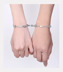 Detail of S925 silver magnetic bracelets with woven ropes for couples and lovers