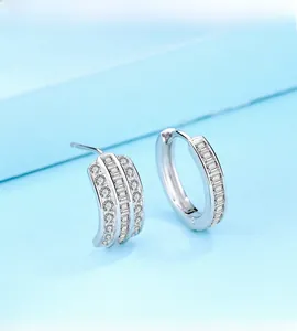Detailed close-up of S925 sterling silver earrings with three rows of sparkling zircon
